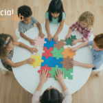 An overhead view of diverse children and an adult collaborating to piece together large, colorful puzzle blocks. This illustrates the collaborative, human-centric design approach for educational AI that is often missing from modern EdTech.