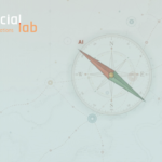 A navigational compass with a needle pointing northwest toward an AI marker over a cartographic map grid on the official MediaAI Compass site.